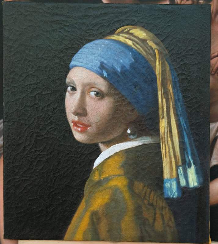 Reproduction de Vermeer, La jeune fille à la perle sur toile agée